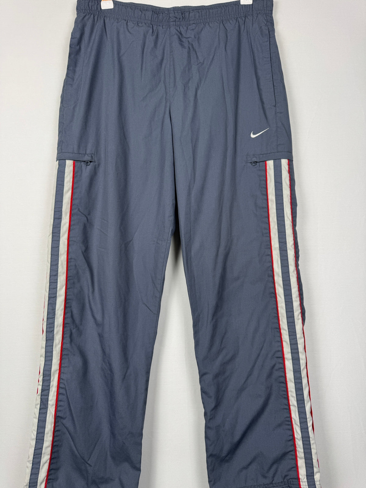 Nike Early 2000s Vintage Grey Track Bottoms with White and Red Accent Piping