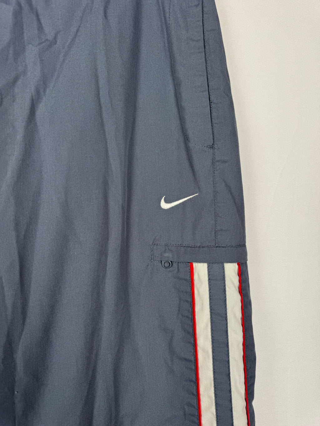 Nike Early 2000s Vintage Grey Track Bottoms with White and Red Accent Piping
