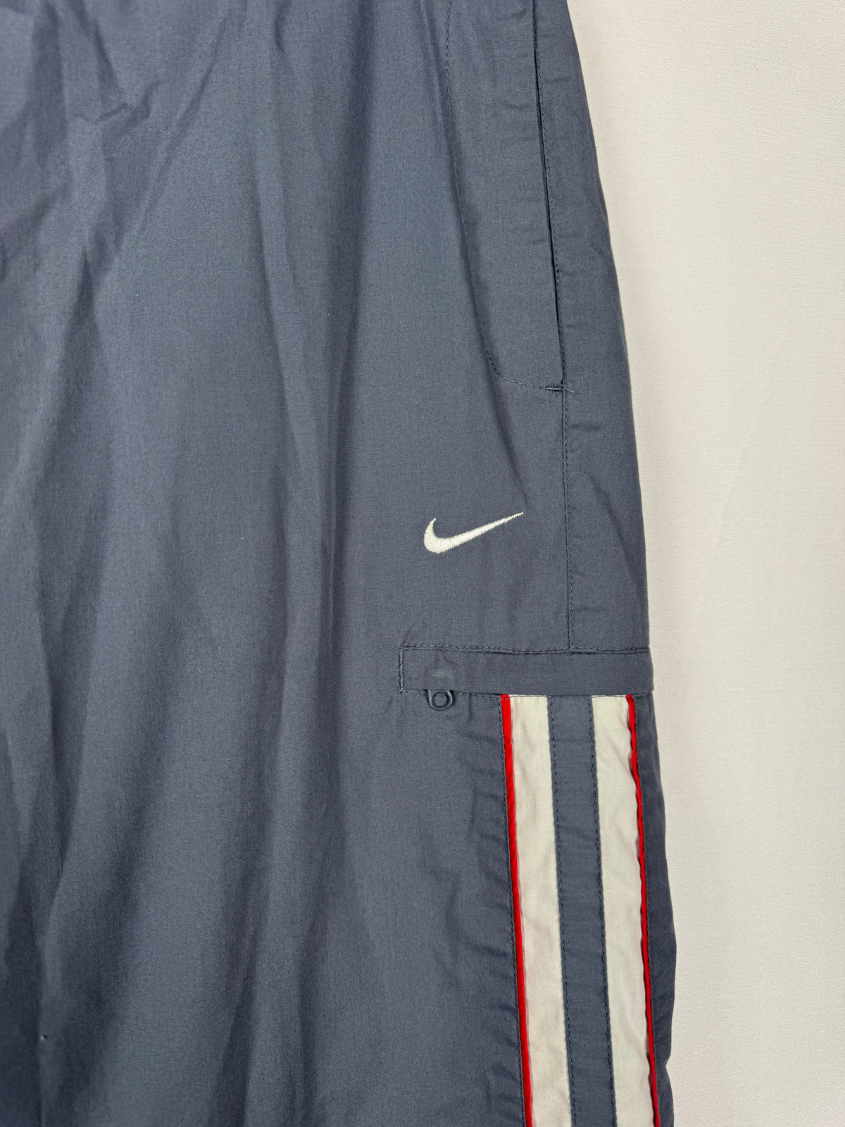 Nike Early 2000s Vintage Grey Track Bottoms with White and Red Accent Piping