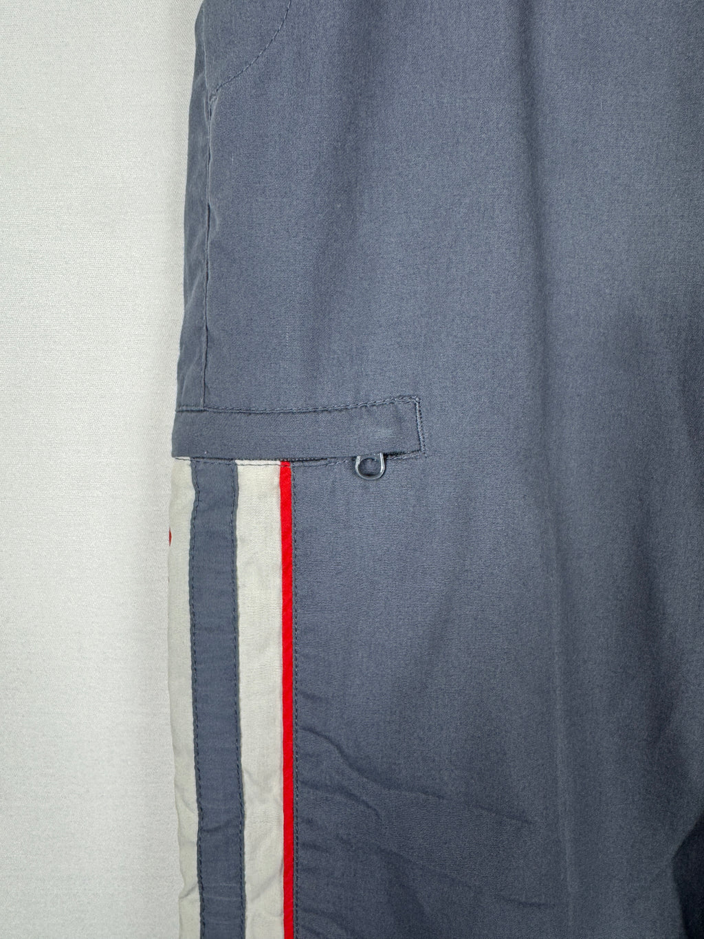 Nike Early 2000s Vintage Grey Track Bottoms with White and Red Accent Piping