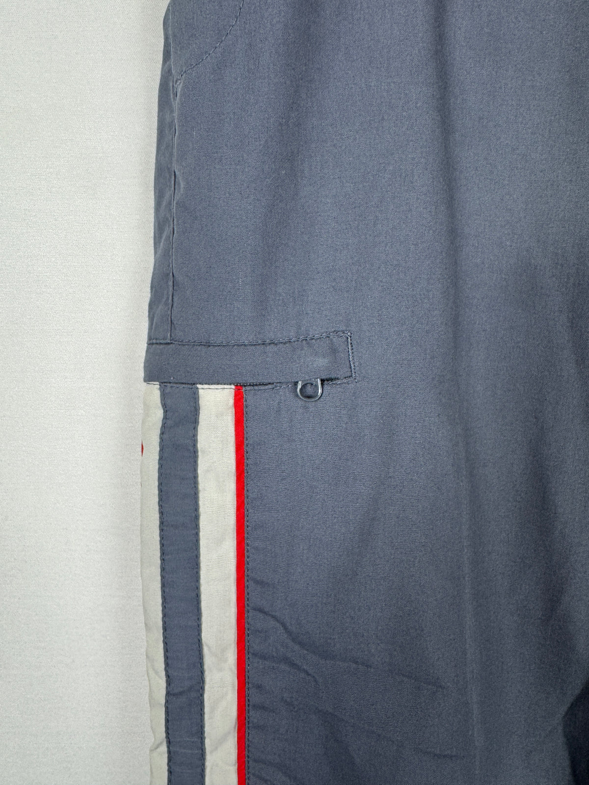 Nike Early 2000s Vintage Grey Track Bottoms with White and Red Accent Piping