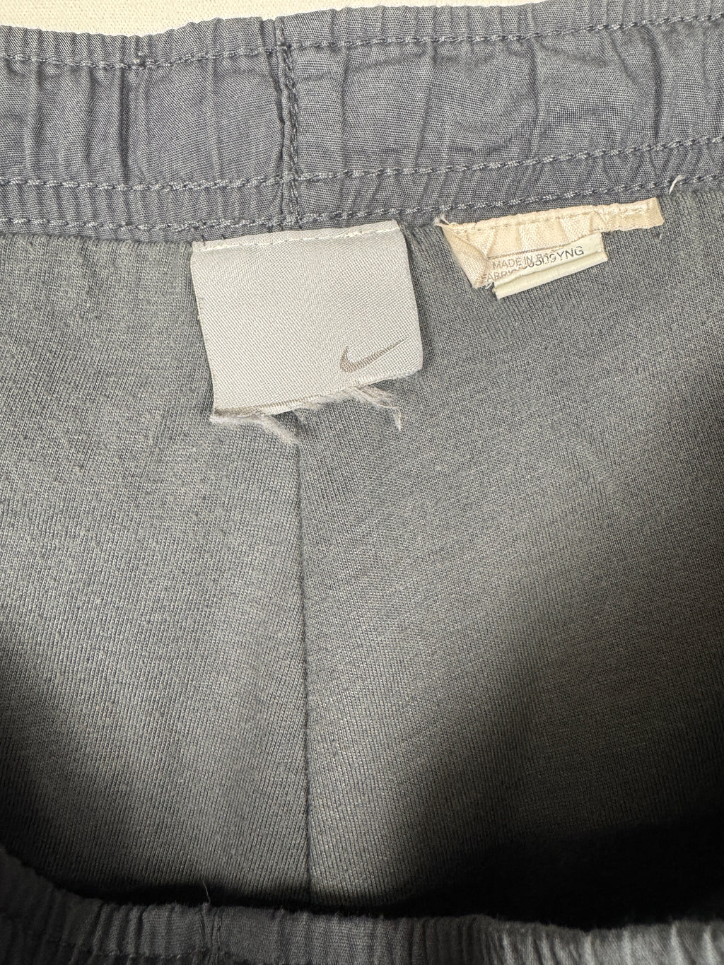 Nike Early 2000s Vintage Grey Track Bottoms with White and Red Accent Piping